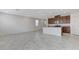 Spacious open layout with tile flooring, recessed lighting, and combined kitchen area at 7006 Sylmar Ave, Las Vegas, NV 89113