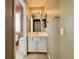 Traditional bathroom with a single vanity sink, with view of attached toilet at 7173 Dravite Ct, Las Vegas, NV 89148