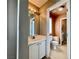 Bathroom with a white vanity, toilet, updated fixtures, and lighting; a functional and stylish space at 7173 Dravite Ct, Las Vegas, NV 89148