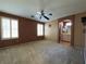 Spacious main bedroom with large windows, carpet flooring, and an ensuite bathroom at 7173 Dravite Ct, Las Vegas, NV 89148