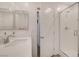 Bright bathroom showcasing a white vanity, modern sink, and glass-enclosed shower at 7320 N Decatur Blvd # 5, Las Vegas, NV 89131
