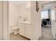 Powder room featuring modern sink, vanity and views to adjacent office at 7320 N Decatur Blvd # 5, Las Vegas, NV 89131