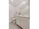 Well-lit bathroom featuring white vanity, modern sink, and wood-style flooring at 7320 N Decatur Blvd # 5, Las Vegas, NV 89131