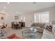 Cozy living room with dining area, featuring hardwood floors and comfortable seating arrangement at 7320 N Decatur Blvd # 5, Las Vegas, NV 89131