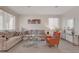 Well lit living room featuring neutral decor, plank flooring and comfortable seating at 7320 N Decatur Blvd # 5, Las Vegas, NV 89131