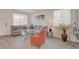 Bright living room with plank flooring, comfortable sofas, and a modern glass coffee table at 7320 N Decatur Blvd # 5, Las Vegas, NV 89131