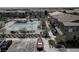 A bird's eye view shows a well-kept community pool, parking and attractive townhomes at 7320 N Decatur Blvd # 5, Las Vegas, NV 89131