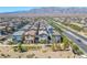 Panoramic aerial view of homes in a desert community with mountain backdrop at 7323 Sunray Point St, North Las Vegas, NV 89084