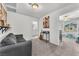 View of living room, featuring plush sofa and art on the walls at 7323 Sunray Point St, North Las Vegas, NV 89084