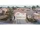 Charming two-story home with a three car garage and a low maintenance yard at 810 Roaring Falls Ave, Henderson, NV 89052