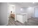 Hallway with modern cabinets and a view into the adjacent bathroom at 810 Roaring Falls Ave, Henderson, NV 89052