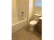 Clean bathroom with a bathtub and shower combination and white toilet at 8111 Switchback Run St, Las Vegas, NV 89166