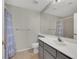 Bathroom featuring single sink vanity, light gray walls, and shower with patterned curtain at 840 Picotte St # 101, Las Vegas, NV 89144