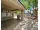 Mailboxes in a common area with shade trees and a place to post community news at 840 Picotte St # 101, Las Vegas, NV 89144