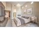 Serene main bedroom with a fireplace, elegant furnishings, and decor at 8808 Rozetta Ct, Las Vegas, NV 89134