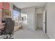 Bedroom features a colorful accent wall, ample natural light, and built-in storage at 8992 Sparkling River Ct, Las Vegas, NV 89178