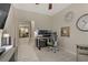 Functional home office space featuring modern desk setup, bright lighting, and a comfortable chair at 8992 Sparkling River Ct, Las Vegas, NV 89178