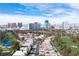 Amazing aerial shot showcasing the golf course community with the Las Vegas skyline as a backdrop at 915 Vegas Valley Dr # 4, Las Vegas, NV 89109