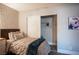 Comfortable bedroom with a twin bed, closet, and brick accent wall at 915 Vegas Valley Dr # 4, Las Vegas, NV 89109