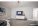Spacious bedroom showcases a TV, dresser, and minimalist decor for comfortable living at 915 Vegas Valley Dr # 4, Las Vegas, NV 89109