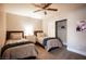 Cozy bedroom with two twin beds, brick accent wall, and closet at 915 Vegas Valley Dr # 4, Las Vegas, NV 89109