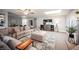 Living room with cozy furniture arrangement, media cabinet, and ample natural light at 915 Vegas Valley Dr # 4, Las Vegas, NV 89109