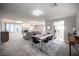 Spacious living room with neutral colors, a stone fireplace, a modern dining area, and lots of natural light at 915 Vegas Valley Dr # 4, Las Vegas, NV 89109