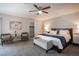 Comfortable main bedroom with large bed, bench, nightstands, and decor at 915 Vegas Valley Dr # 4, Las Vegas, NV 89109
