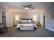 Spacious main bedroom with a ceiling fan and ensuite bathroom access at 915 Vegas Valley Dr # 4, Las Vegas, NV 89109