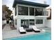 A refreshing backyard pool with lounge chairs, and outdoor patio area at 916 Vegas Valley Dr, Las Vegas, NV 89109