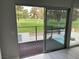 Balcony with a black metal rail overlooking a pool and golf course with trees in the background at 916 Vegas Valley Dr, Las Vegas, NV 89109