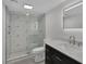 Modern bathroom features stylish geometric tile in the walk-in shower at 916 Vegas Valley Dr, Las Vegas, NV 89109