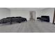 Spacious bedroom featuring grey toned flooring and ample space for furniture at 916 Vegas Valley Dr, Las Vegas, NV 89109