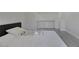 Bright bedroom featuring hard wood floors, a window, and neutral paint at 916 Vegas Valley Dr, Las Vegas, NV 89109