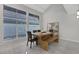 Sunlit dining area with large windows and modern table at 916 Vegas Valley Dr, Las Vegas, NV 89109