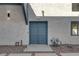 Inviting blue double front door with modern exterior details, showcasing curb appeal at 916 Vegas Valley Dr, Las Vegas, NV 89109
