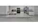 Modern kitchen with stainless steel appliances, granite countertops, and white cabinets at 916 Vegas Valley Dr, Las Vegas, NV 89109
