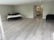 Open layout living room featuring an attached bathroom and a view into a bedroom with beds at 916 Vegas Valley Dr, Las Vegas, NV 89109