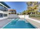 Back yard pool area with ample seating and green scenery at 916 Vegas Valley Dr, Las Vegas, NV 89109