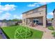 Backyard with outdoor pool, playground and covered patio at 9212 Lunar Effect St, Las Vegas, NV 89143