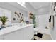 Bright bathroom features double sinks and shower-tub combo at 9212 Lunar Effect St, Las Vegas, NV 89143