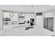 Modern kitchen featuring a large island with seating and stainless steel appliances at 9212 Lunar Effect St, Las Vegas, NV 89143