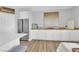 Bright kitchen featuring stainless steel appliances and wood grain flooring at 9212 Lunar Effect St, Las Vegas, NV 89143