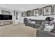 Comfortable upstairs living room with neutral carpet and décor at 9212 Lunar Effect St, Las Vegas, NV 89143