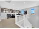 Upstairs living area featuring sports memorabilia and views from large windows at 9212 Lunar Effect St, Las Vegas, NV 89143