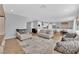 Spacious open concept living room with luxury vinyl plank flooring at 9212 Lunar Effect St, Las Vegas, NV 89143