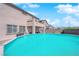Beautiful backyard pool on a sunny day, perfect for relaxation and outdoor enjoyment at 9212 Lunar Effect St, Las Vegas, NV 89143