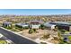 Aerial shot shows the Regency at Summerlin community center with a circular drive, surrounded by lush landscaping and community amenities at 9928 Regency Square Ave, Las Vegas, NV 89148