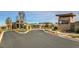Regency at Summerlin community entrance showcases modern architecture and well-maintained landscaping, inviting and secure at 9928 Regency Square Ave, Las Vegas, NV 89148