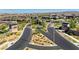 Community entrance view of Regency at Summerlin with manicured greenery, offering a welcoming and upscale introduction to the neighborhood at 9928 Regency Square Ave, Las Vegas, NV 89148